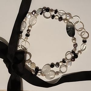 Beautiful crystal adorned Stella & Dot necklace with adjustable bow tie.